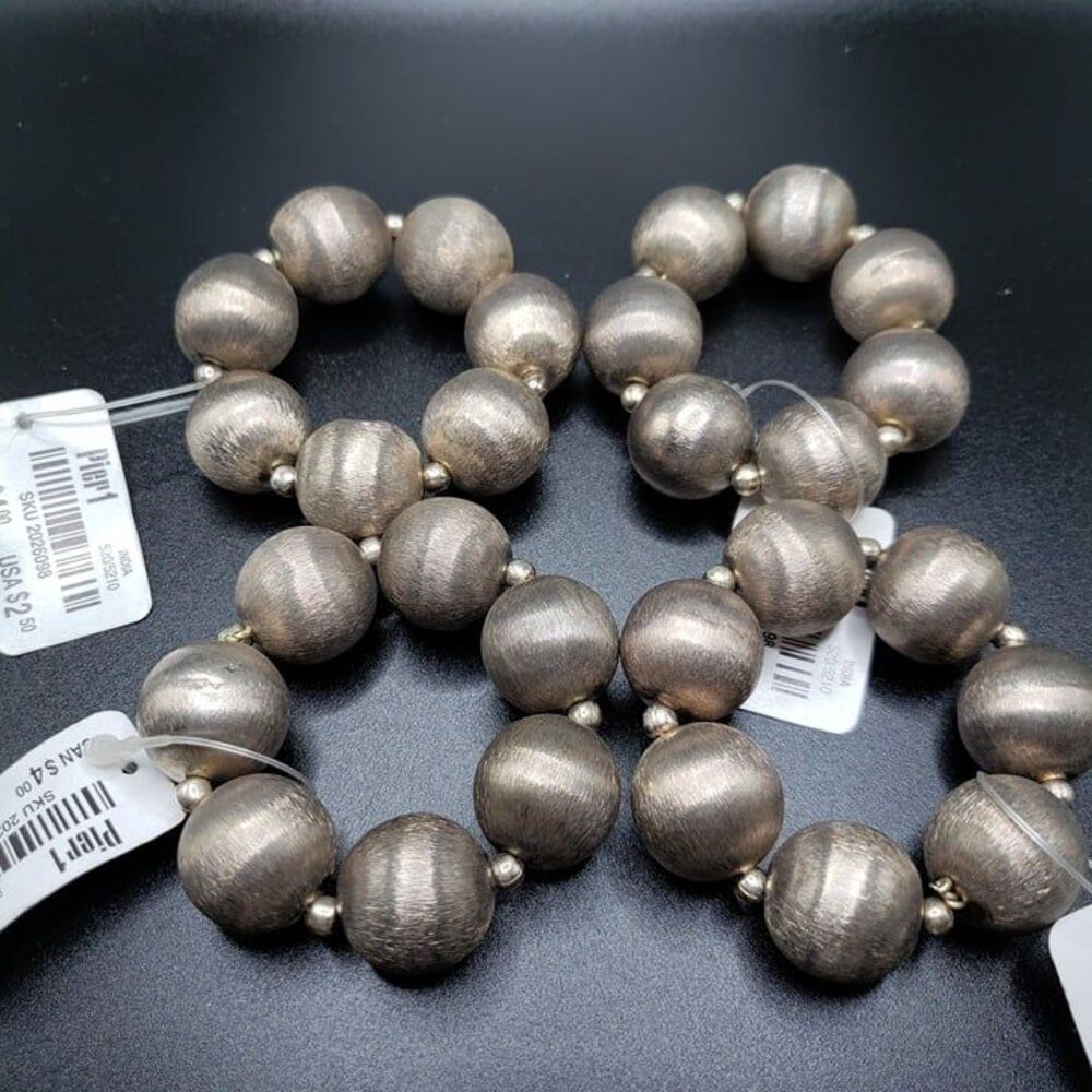 Pier 1 One Silver Ball Gray Napkin Ring Holders 4-Piece Luxe Accent NEW NWT